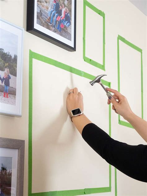 Premiering your picture wall. Once the hooks or nails are in place, remove all paper templates carefully so the tape doesn’t leave marks. Now for the best part – hanging your pictures. If you want, use a spirit level to get everything straight. There! All done. See all wall art. ". Before hanging a piece of wall décor, choosing the right ... 